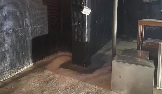 A waterproofed basement wall