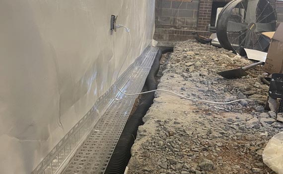 restoration of clogged drain tile  through cleaning