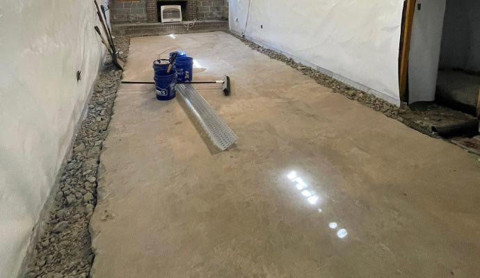 Basement drainage system installation is in progress
