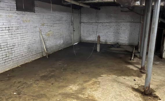 a basement flooded with water.