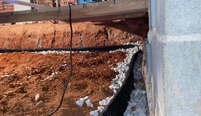 Crawl space drainage system