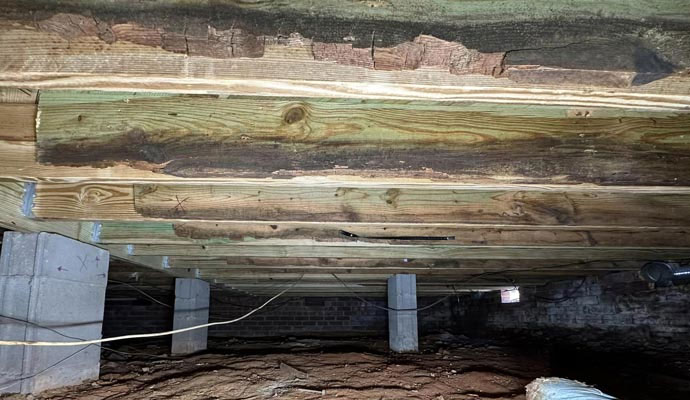 Damaged crawl space girders