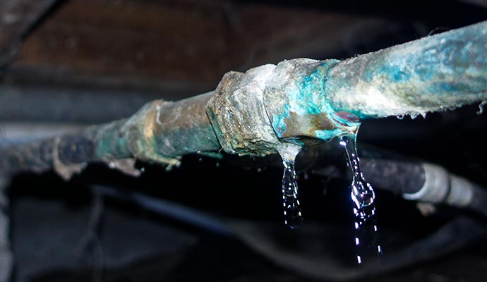 Corroded leaking pipe